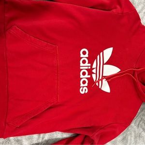 Like a new men’s size, large red Adidas hoodie.